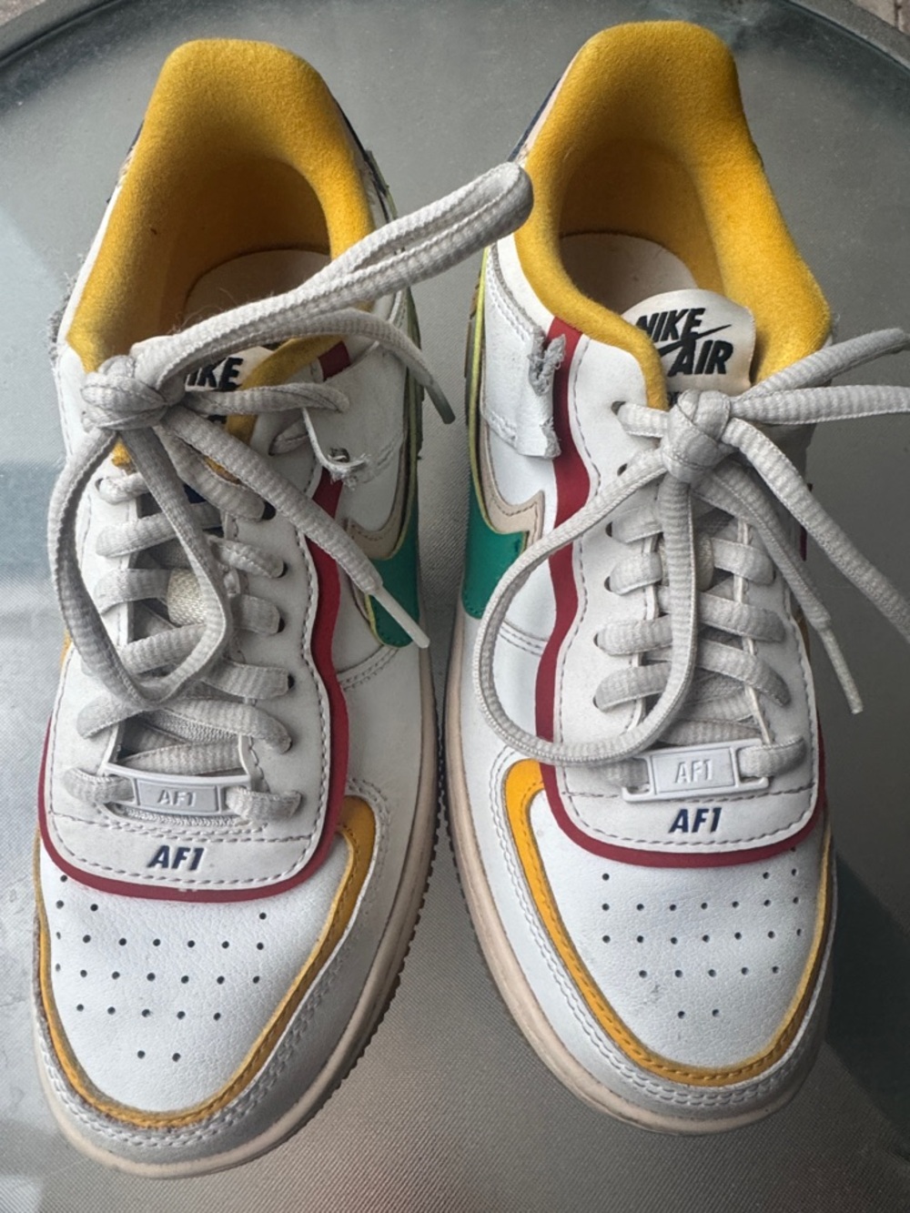 Youth Nike Kids AF1 Shadow Low White Sneakers with Yellow, Red and Green Accents